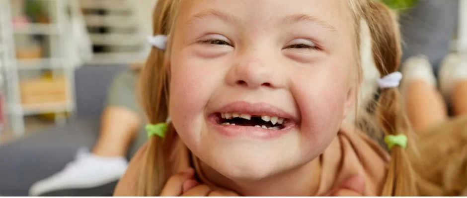 girl with special needs smiling